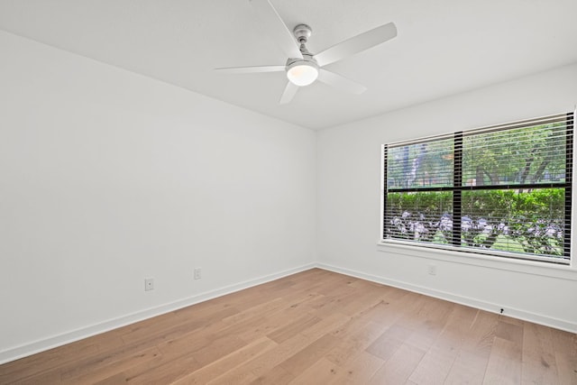 703 Stagecoach Trl, San Marcos, TX 78666 - spare room with light wood-type flooring and a ceiling fan