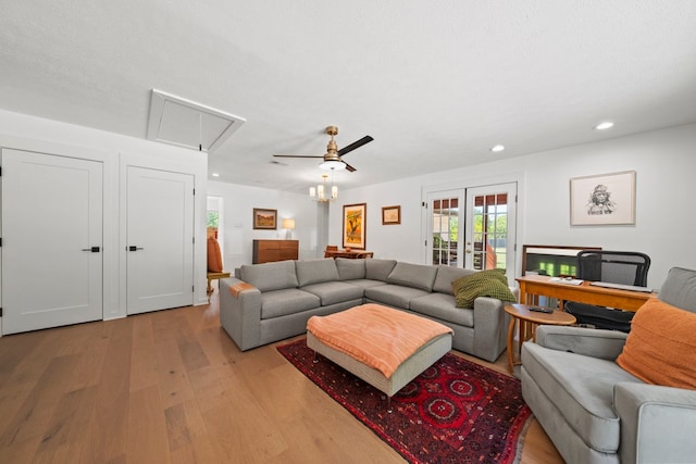 703 Stagecoach Trl, San Marcos, TX 78666 - living room featuring attic access, light wood-style flooring, recessed lighting, and a ceiling fan