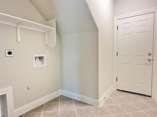 142 E Pauwela Ln, Bastrop, TX 78602 - washroom featuring electric dryer hookup, washer hookup, light tile patterned floors, and gas dryer hookup