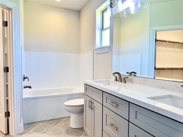 142 E Pauwela Ln, Bastrop, TX 78602 - full bath with a bath, tile patterned floors, double vanity, and a walk in closet