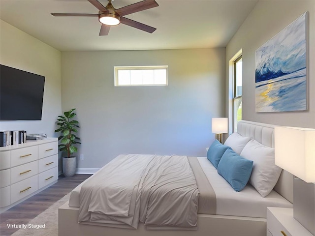 142 E Pauwela Ln, Bastrop, TX 78602 - bedroom featuring wood finished floors and a ceiling fan