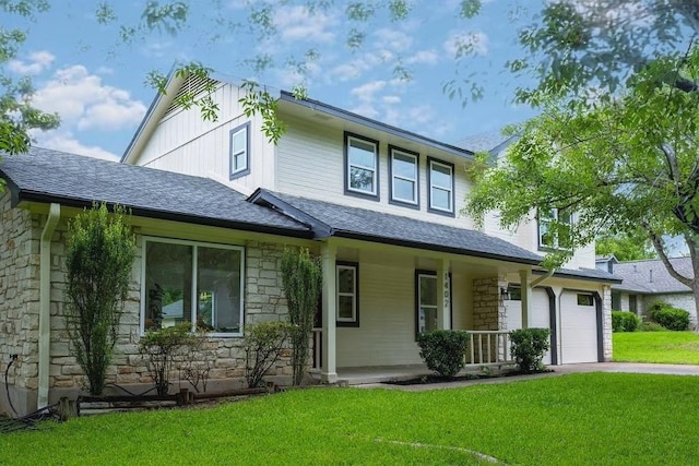 1402 Monica St, Austin, TX 78758 - view of front of home featuring stone siding, a front yard, a shingled roof, a porch, and a garage