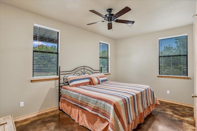 542 Stars And Stripes, Fischer, TX 78623 - bedroom with concrete floors and ceiling fan