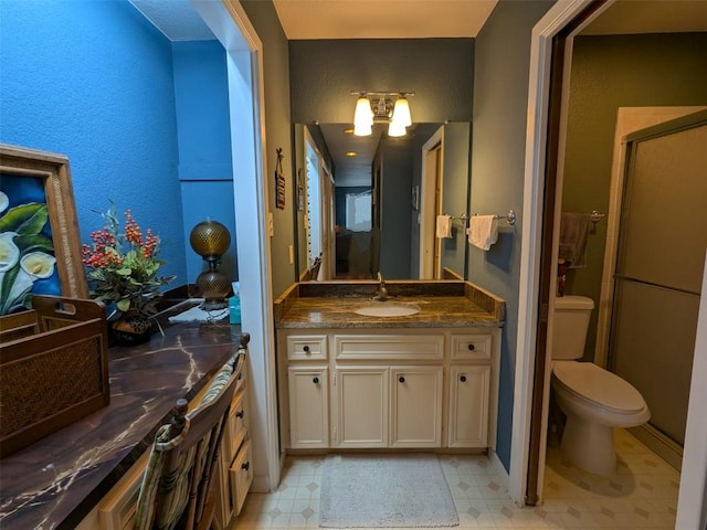 201 E Noton St Unit 105, Pflugerville, TX 78660 - bathroom with vanity, a stall shower, and tile patterned floors