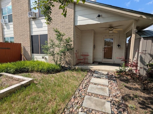 201 E Noton St Unit 105, Pflugerville, TX 78660 - view of exterior entry featuring a ceiling fan and cooling unit