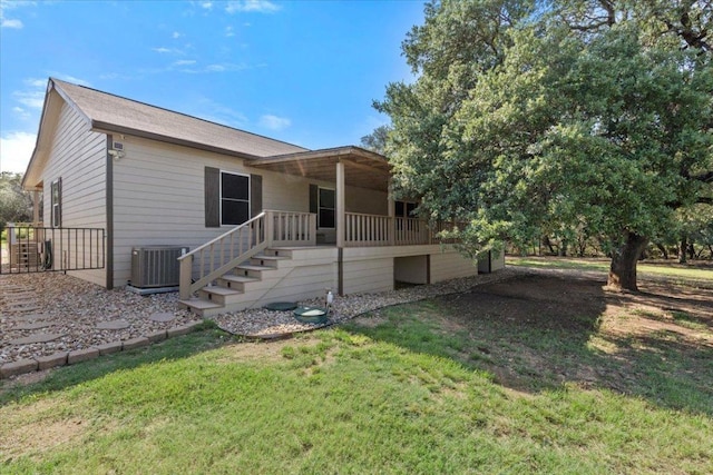 111 Lazy Trail Ct, Liberty Hill, TX 78642 - back of house with a lawn