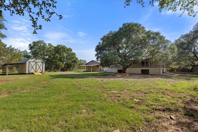 111 Lazy Trail Ct, Liberty Hill, TX 78642 - view of green lawn featuring a storage unit