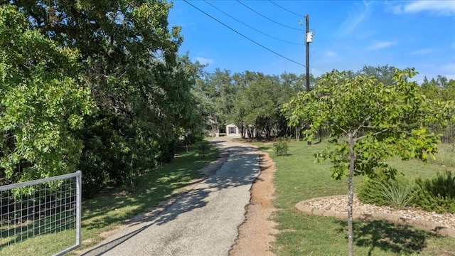 111 Lazy Trail Ct, Liberty Hill, TX 78642 - view of asphalt driveway