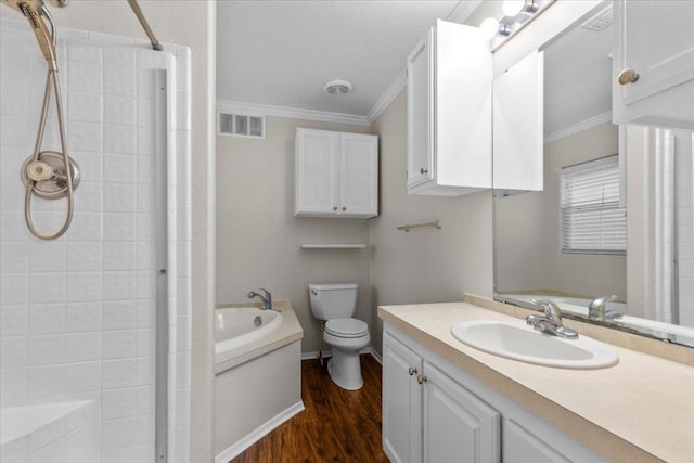 111 Lazy Trail Ct, Liberty Hill, TX 78642 - bathroom with wood finished floors, tiled shower, crown molding, and vanity
