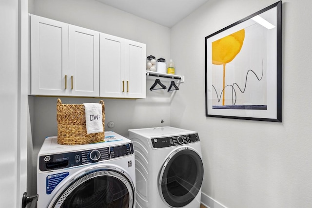 435 Emory Crossing Blvd, Hutto, TX 78634 - washroom featuring washing machine and clothes dryer and cabinet space