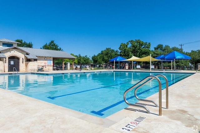 605 Whistlers Walk Trl, Cedar Park, TX 78613 - community pool with a patio