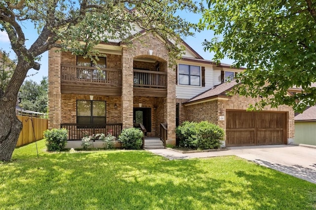 605 Whistlers Walk Trl, Cedar Park, TX 78613 - view of front of property featuring a balcony, brick siding, covered porch, and driveway
