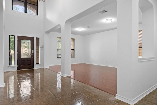 605 Whistlers Walk Trl, Cedar Park, TX 78613 - tiled foyer featuring baseboards and arched walkways