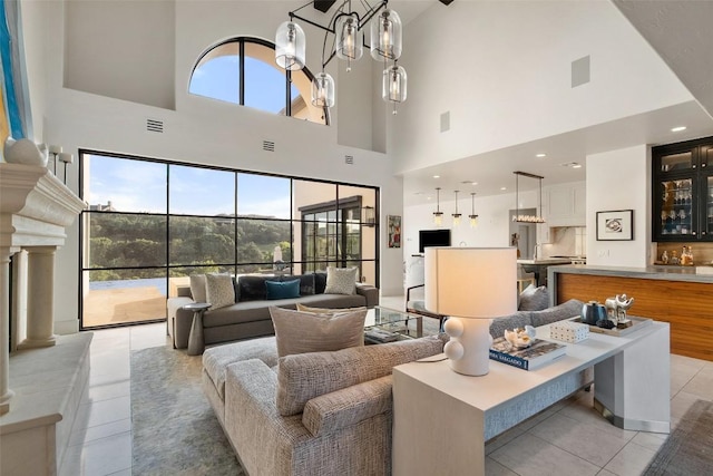 1508 Mesa Ridge Ln, Austin, TX 78735 - living room featuring light tile patterned floors and a high ceiling
