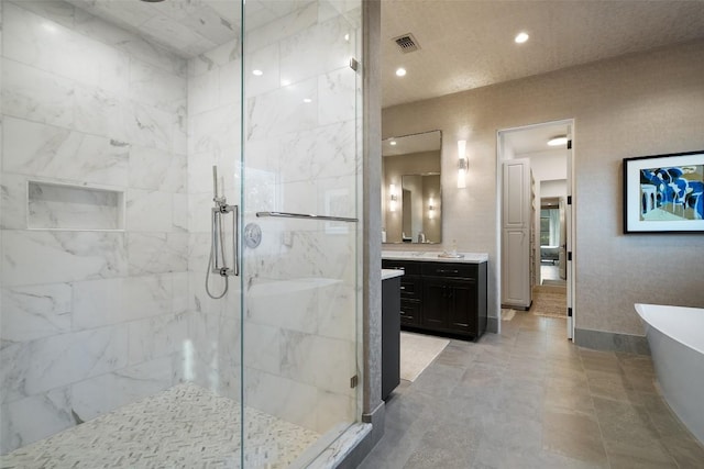 1508 Mesa Ridge Ln, Austin, TX 78735 - full bathroom with a marble finish shower, vanity, a freestanding bath, and recessed lighting
