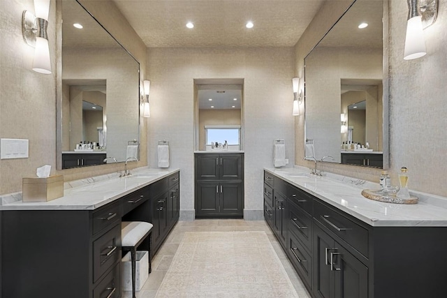 1508 Mesa Ridge Ln, Austin, TX 78735 - bathroom with two vanities and recessed lighting