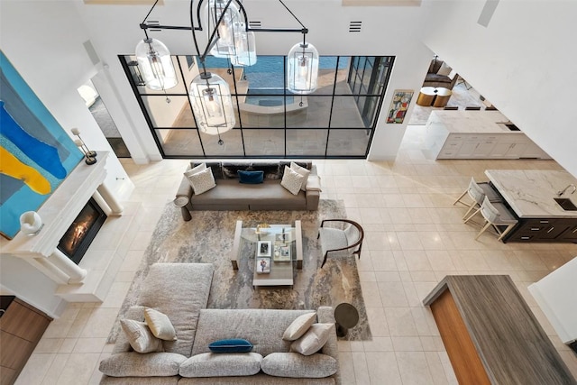 1508 Mesa Ridge Ln, Austin, TX 78735 - tiled living room with a towering ceiling