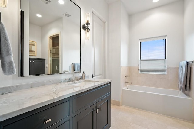 1508 Mesa Ridge Ln, Austin, TX 78735 - full bathroom featuring vanity, a garden tub, tile patterned flooring, and recessed lighting