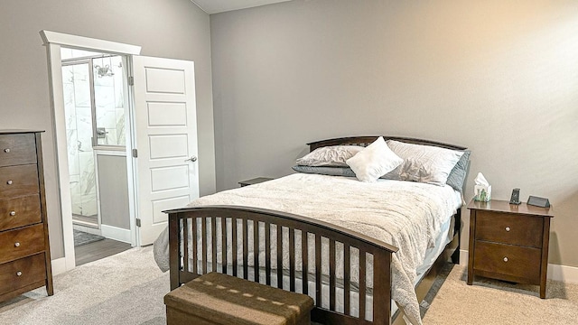 177 Mokulua Ln, Bastrop, TX 78602 - bedroom featuring carpet floors and connected bathroom