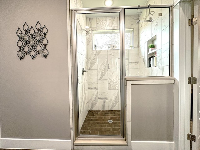 177 Mokulua Ln, Bastrop, TX 78602 - full bathroom featuring a marble finish shower