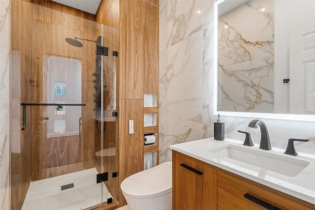 2817 Barefoot Ln, Round Rock, TX 78665 - bathroom featuring vanity, tile walls, and a marble finish shower