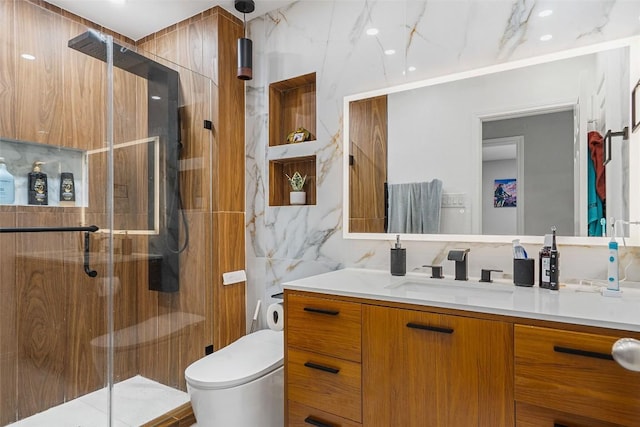 2817 Barefoot Ln, Round Rock, TX 78665 - bathroom featuring vanity, a marble finish shower, and tile walls