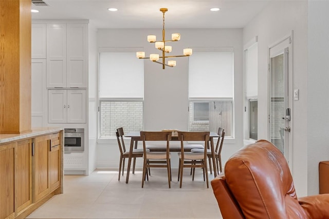 2817 Barefoot Ln, Round Rock, TX 78665 - dining room featuring a chandelier and recessed lighting