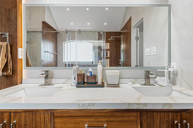 2817 Barefoot Ln, Round Rock, TX 78665 - bathroom with double vanity, a shower stall, and recessed lighting