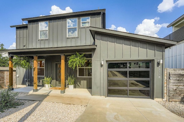 7311 Providence Ave Unit B, Austin, TX 78752 - view of front of property with board and batten siding and driveway