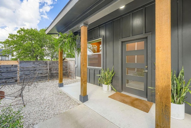 7311 Providence Ave Unit B, Austin, TX 78752 - property entrance with board and batten siding and a patio area