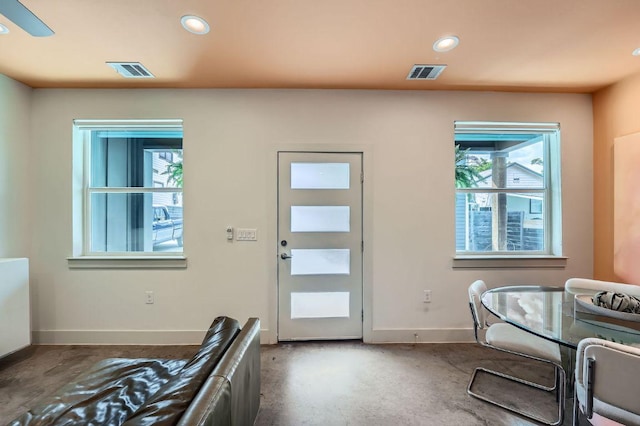 7311 Providence Ave Unit B, Austin, TX 78752 - foyer with plenty of natural light, concrete flooring, and recessed lighting