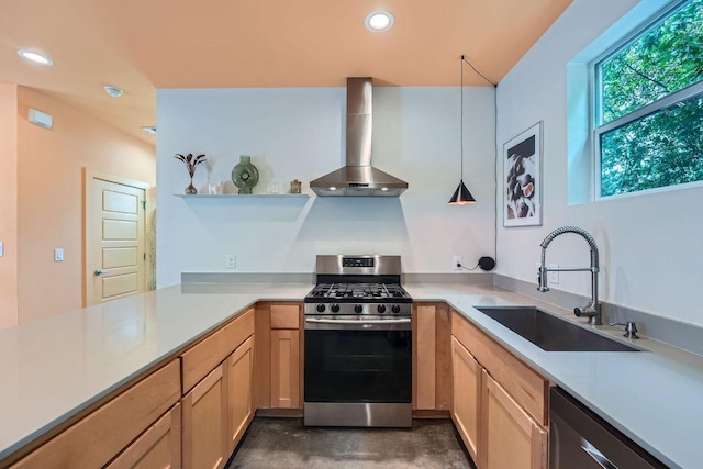 7311 Providence Ave Unit B, Austin, TX 78752 - kitchen featuring appliances with stainless steel finishes, wall chimney range hood, light countertops, open shelves, and recessed lighting