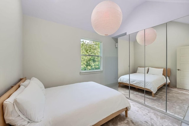 7311 Providence Ave Unit B, Austin, TX 78752 - bedroom with vaulted ceiling and a closet