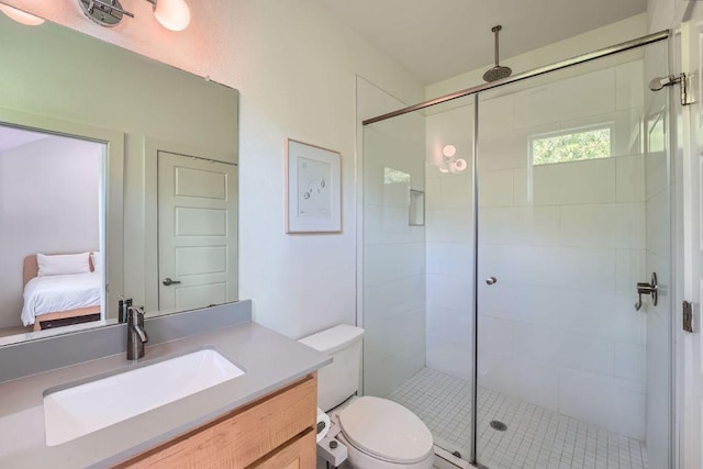 7311 Providence Ave Unit B, Austin, TX 78752 - bathroom with vanity, a stall shower, and ensuite bath