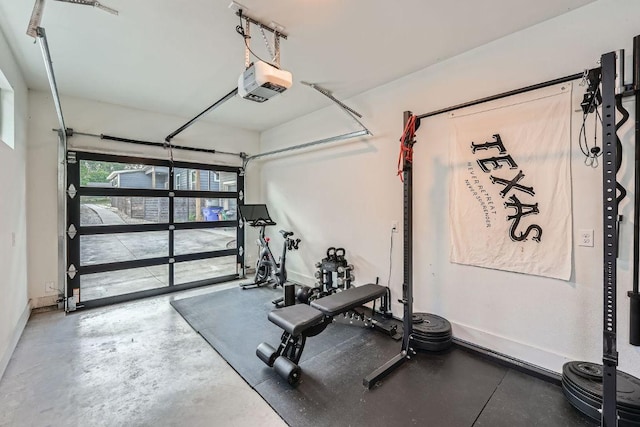 7311 Providence Ave Unit B, Austin, TX 78752 - exercise room with a garage and baseboards