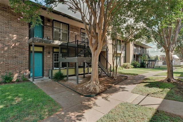 7685 Northcross Dr Unit 605, Austin, TX 78757 - view of property with stairway