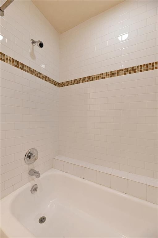 7685 Northcross Dr Unit 605, Austin, TX 78757 - full bathroom with washtub / shower combination