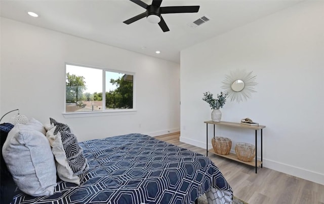 7306 Carver Ave Unit 1, Austin, TX 78752 - bedroom featuring wood finished floors, recessed lighting, and a ceiling fan