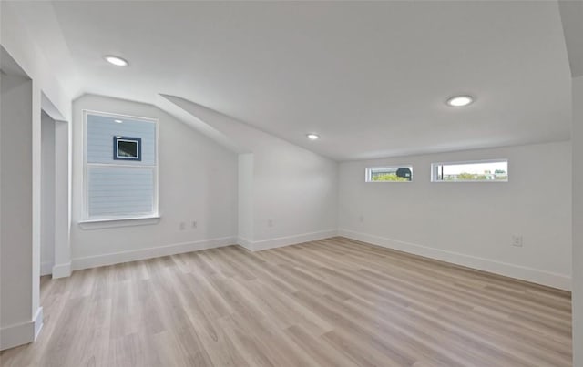 7306 Carver Ave Unit 1, Austin, TX 78752 - bonus room featuring vaulted ceiling, light wood-type flooring, and recessed lighting