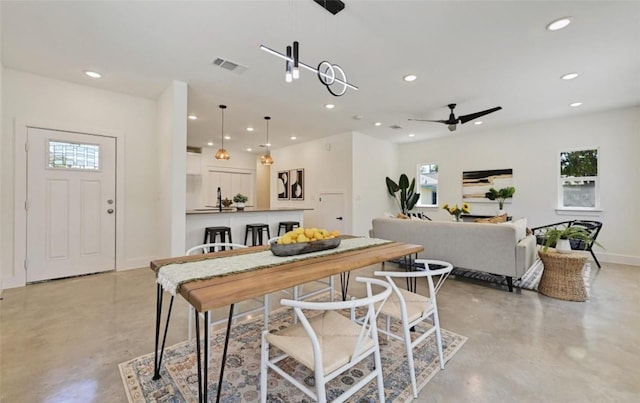 7306 Carver Ave Unit 1, Austin, TX 78752 - dining room with concrete flooring, recessed lighting, healthy amount of natural light, and ceiling fan