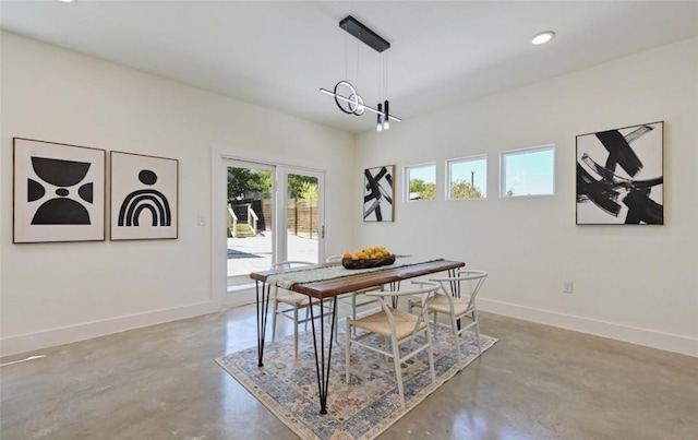 7306 Carver Ave Unit 1, Austin, TX 78752 - dining area with concrete flooring and recessed lighting