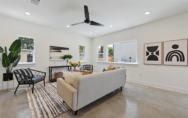 7306 Carver Ave Unit 1, Austin, TX 78752 - living area with concrete floors, ceiling fan, and recessed lighting