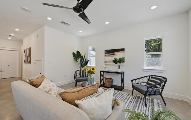 7306 Carver Ave Unit 1, Austin, TX 78752 - living area with ceiling fan, recessed lighting, and concrete floors