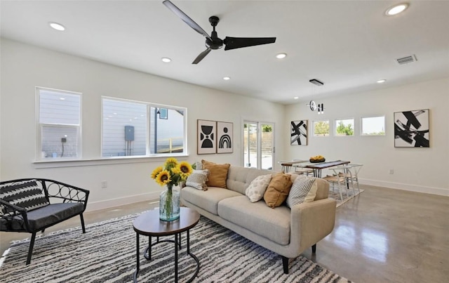 7306 Carver Ave Unit 1, Austin, TX 78752 - living area with concrete floors, recessed lighting, and a ceiling fan