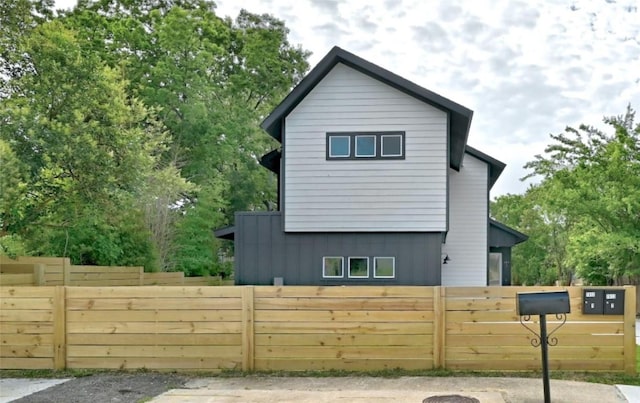 7613 Providence Ave Unit 1, Austin, TX 78752 - view of side of property with board and batten siding