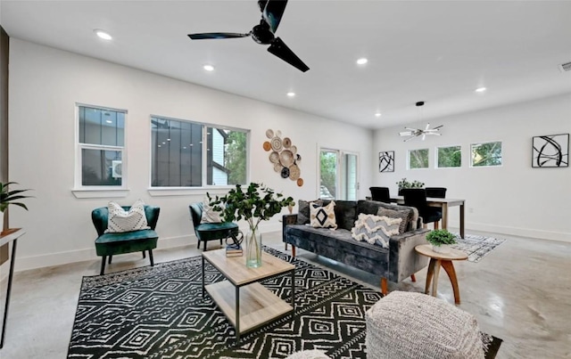 7613 Providence Ave Unit 1, Austin, TX 78752 - living area featuring ceiling fan, finished concrete floors, and recessed lighting