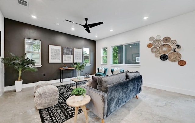 7613 Providence Ave Unit 1, Austin, TX 78752 - living room featuring a ceiling fan, recessed lighting, and concrete floors