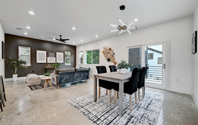 7613 Providence Ave Unit 1, Austin, TX 78752 - dining space with finished concrete floors, recessed lighting, a chandelier, and a ceiling fan