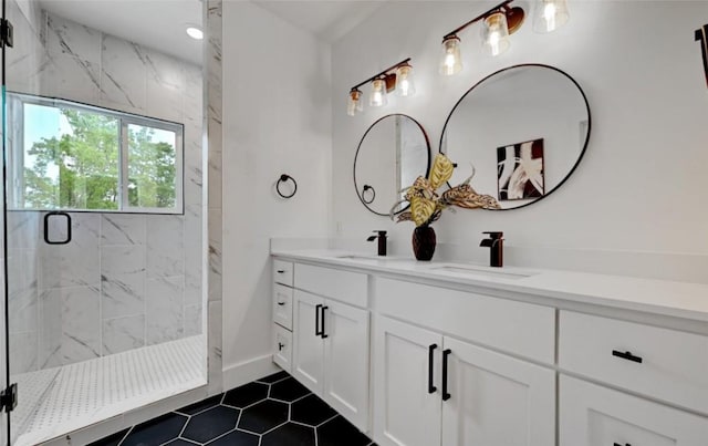 7613 Providence Ave Unit 1, Austin, TX 78752 - full bathroom with double vanity, a marble finish shower, and tile patterned floors