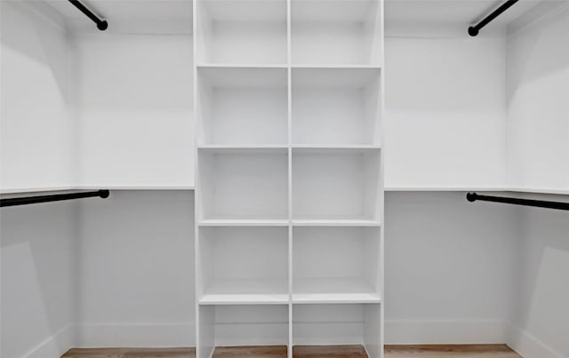 7613 Providence Ave Unit 1, Austin, TX 78752 - spacious closet with wood finished floors